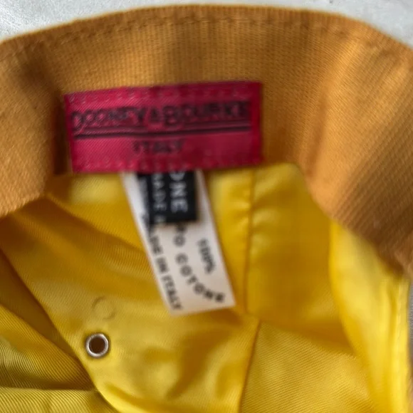 Dooney & Bourke Elegant Yellow Women's Cap with Monogram Design - Picture 5 of 5